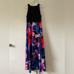Vince Camuto high-low dress, sleeveless. Black top, floral bottom.